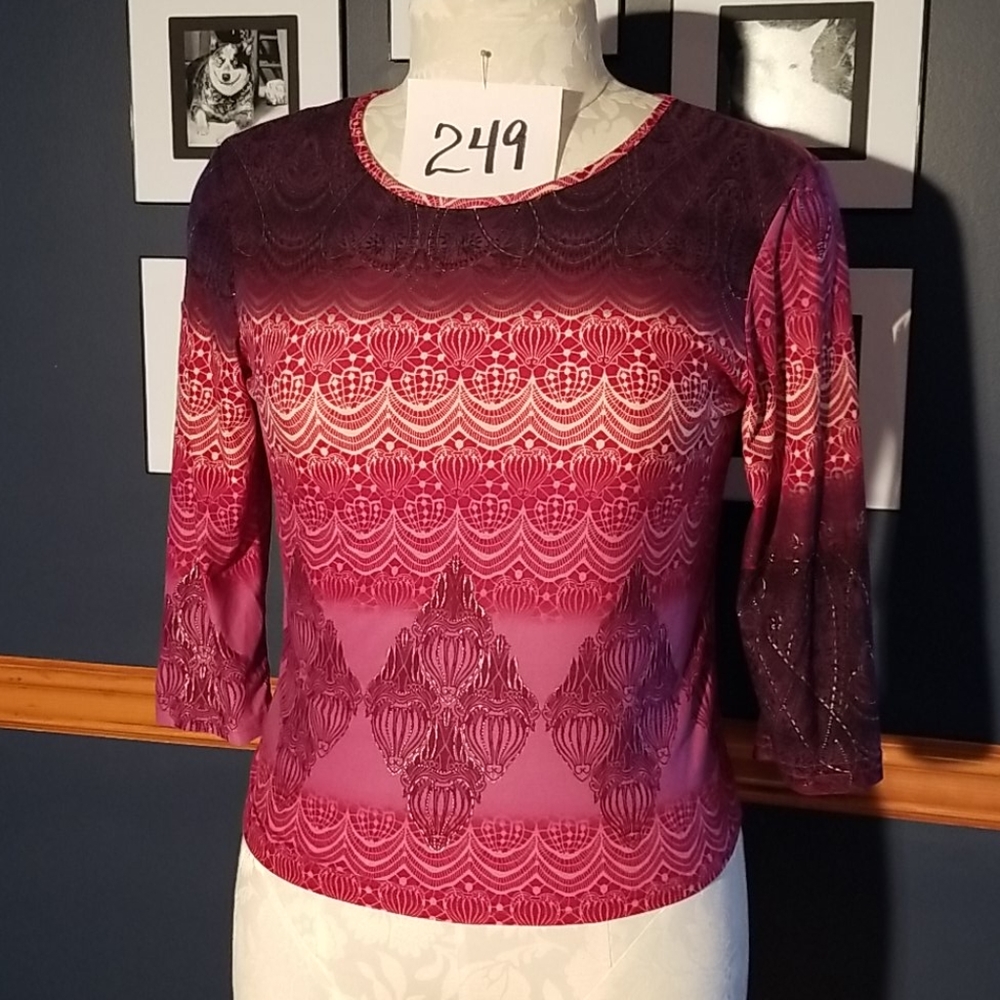 Cute 3/4 sleeve Knit Top.  Some stretch.